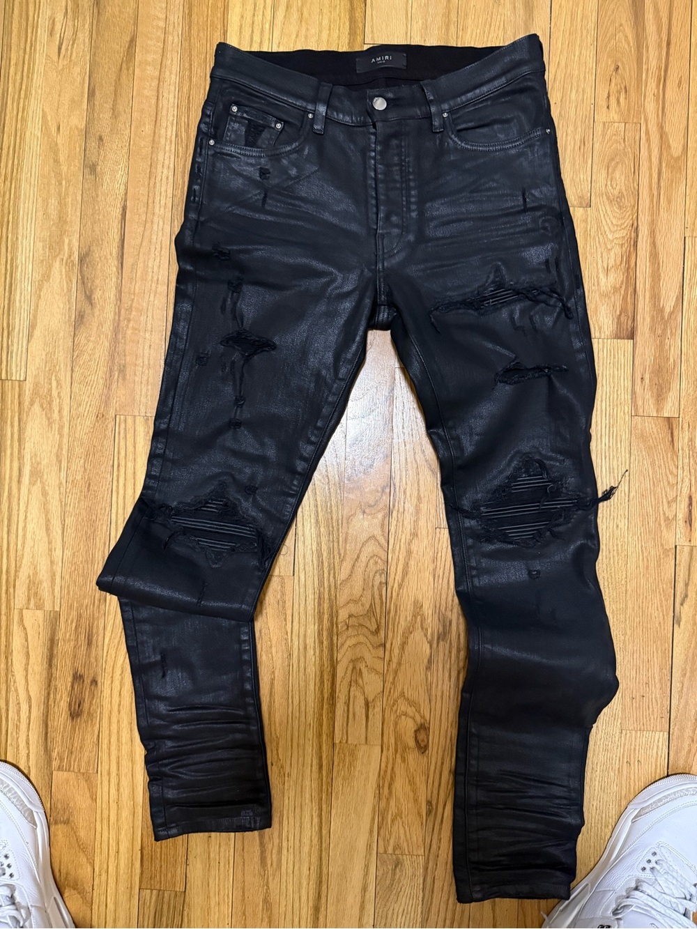 AMIRI Black Distressed Coated Skinny Jeans